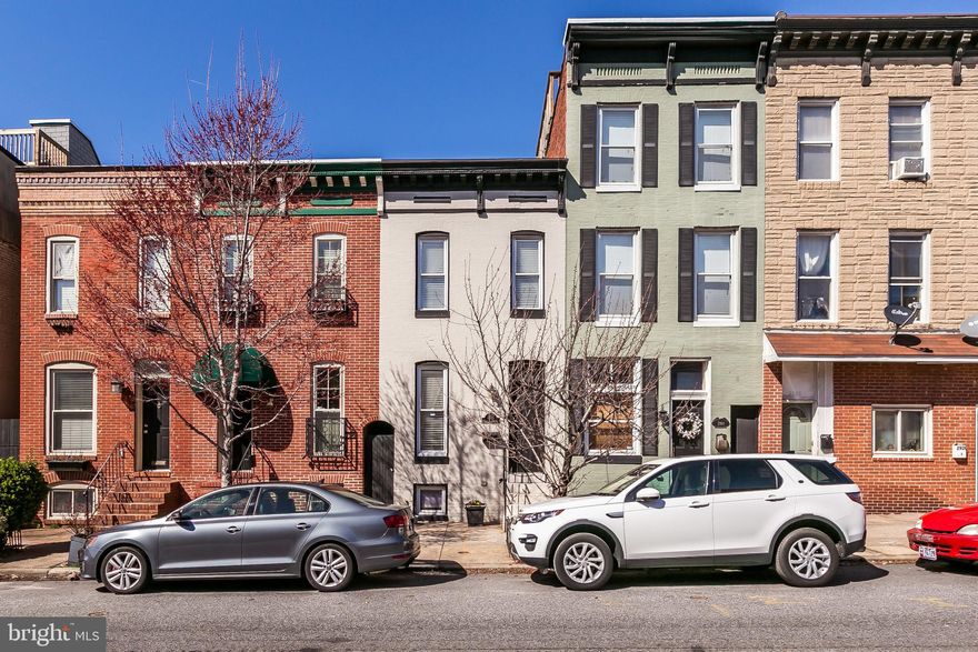 You will know you re in Charm City when you live in this Canton rowhome because it has all the iconic features: a massive roof deck with city views, private back patio, exposed brick interior walls, original pine floors, lofted ceilings, a fireplace, natural light throughout and exposed wood beams. This home hasn t been left in the past though, the modern layout gives you two master suites, a half bathroom and laundry on the main level, central air conditioning/heat, and a timeless white kitchen, complete with subway tile backsplash and stainless steel appliances. The location is as central as it gets in Canton, walkable to both Patterson Park and Canton Waterfront Park, Canton Square, Safeway grocery store, and a ton of restaurants and bars, including Lee s Pint and Shell, which is at the end of the block. The bike lane on Hudson makes for an easy bike commute or get in the car and jump on the highways, which area easily accessible from this location.