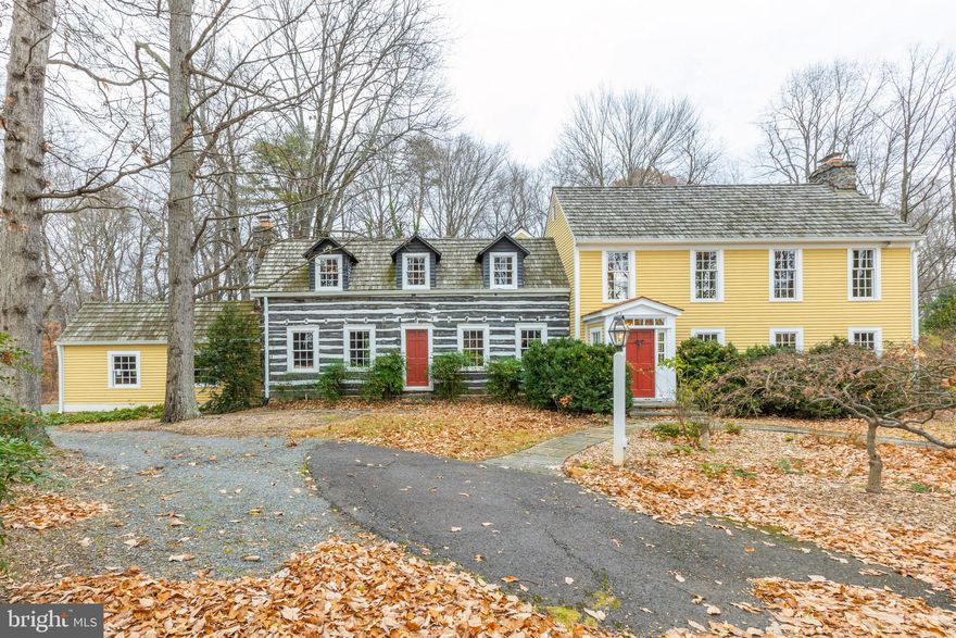 Hooked on Country?  "Country at its best" aptly describes this original LOG HOME (circa 1935) with  an authentic Federal Style  addition (circa 1981 & 1996).  Here at 8516 Old Dominion Drive one truly can step back in time in refined comfort.  The period architecture features over-sized windows, re-purposed heart-of-pine flooring, tall ceilings with exposed beams and brick flooring in the chef's kitchen. Both owner's suite and guest suite enjoy a wood burning fireplace. The den in the log home wing has an original stone fronted fireplace and the remaining  2 fireplaces are in the formal living room and family room.   Move up to country living within the city limits!   DC is minutes away!