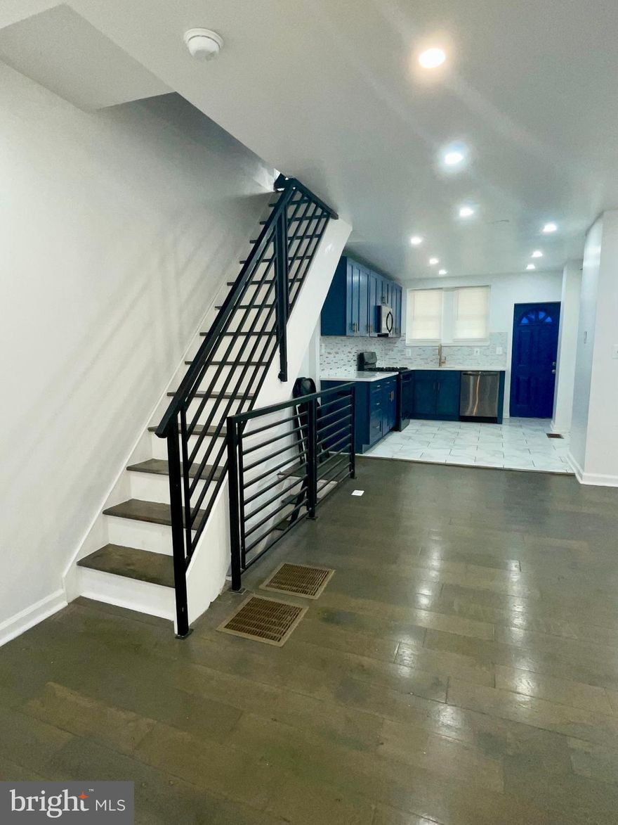 Welcome home to this completely renovated 3bed 1 1/2 bath open concept located right in the heart of South Philadelphia.  It has some amazing features that is a must see. Recessed lighting, beautiful hardwood floors throughout.  Chef's Kitchen with Marble Countertop,  Deep Sink, beautiful gold trimmings,  and stainless steel appliances. Off from your Kitchen door leads to the fenced yard. 
3 bed on the 2nd flr with  bathroom includes which completes this level. Head down to the finished basement where you can use your imaginations for an office or additional living space. Here you'll find a 1/2 bath, laundry area with hook up is available. This property is close to everything that boast about Philadelphia: Phila stadiums, Restaurants, Center City, and the Airport. Schedule your appointment today!!!