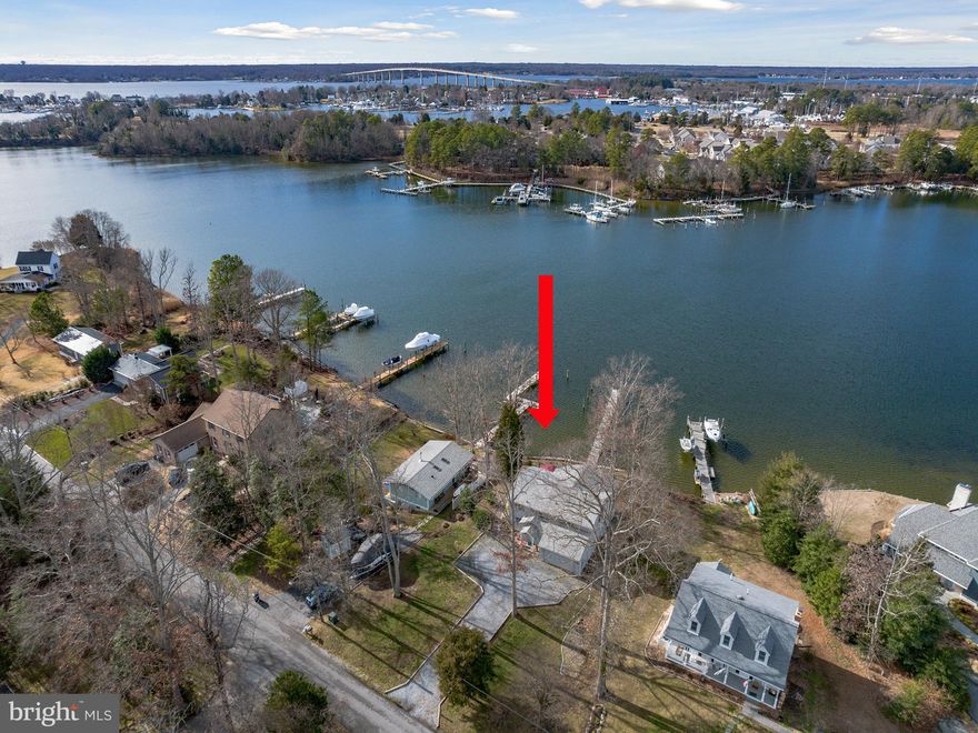 **READY FOR SUMMER, DEEP WATER FOR YACHTS**  This coastal property is located on very deep and protected Mill Creek and is among the very best 'boating promenade' spots of the Chesapeake Bay.  Large Sail and Power boats are welcomed here. Kayaking, SUP are also popular! The cheerful and bright 4BR/3BA contemporary home is focused on outdoor living, quiet retreat, and year round sunsets. It is in move-in ready condition, and the newer pier has two 40'+ slips with 8ft MLW+.  You will not want to leave this creek view, and the elevation of the lot is perfect. Easy walk to/from the pier, perfect elevation...we all know that these are important lot features that are not always available. This outstanding Mill Creek location provides quick access to Solomons Island, the Patuxent River, and  the Chesapeake Bay itself. This particular location on Deer Drive is even more special than most, because of the valuable westerly siting of the home itself, the very deep yachting water, and the opportunity for activity. Watch July 4th fireworks from your deck or patio, join in the July 4th boat parade, enjoy the daily boating action. ***SEPTIC AND WATER QUALITY INSPECTIONS AVAIABLE IN MLS DOCS. ALSO, 4/04/2023 APPRAISAL AVAILABLE FOR REVIEW UPON REQUEST***
