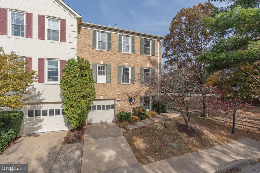 In the heart of Tysons Corner, this gorgeous, updated end-unit garage townhome is a short walk to the Tysons Station Metro. Boasting over $70,000 in recent updates, the main level features vaulted ceilings and a spiral staircase. The formal dining room is perfect for hosting events and gatherings. The completely updated gourmet kitchen (2024) is equipped with high-end stainless steel appliances, a center island workstation, beautiful cabinetry, and designer lighting. This home also has all-new bathrooms with custom walk-in glass showers, double sinks, and designer lighting in the primary bathroom. This floor plan brings together your most enjoyed indoor and outdoor living spaces. Slide open the doors to your expansive deck – ideal for entertaining, grilling, or just enjoying fresh air. You will feel the natural energy that flows through this home. There are two additional upstairs bedrooms, providing space to grow, host guests, or work. The fully finished walk-out lower level offers even more living space. HVAC 2020, HWH 2025, ROOF 2017, CARPET 2025, PAINT 2025, GARAGE DOOR 2023.