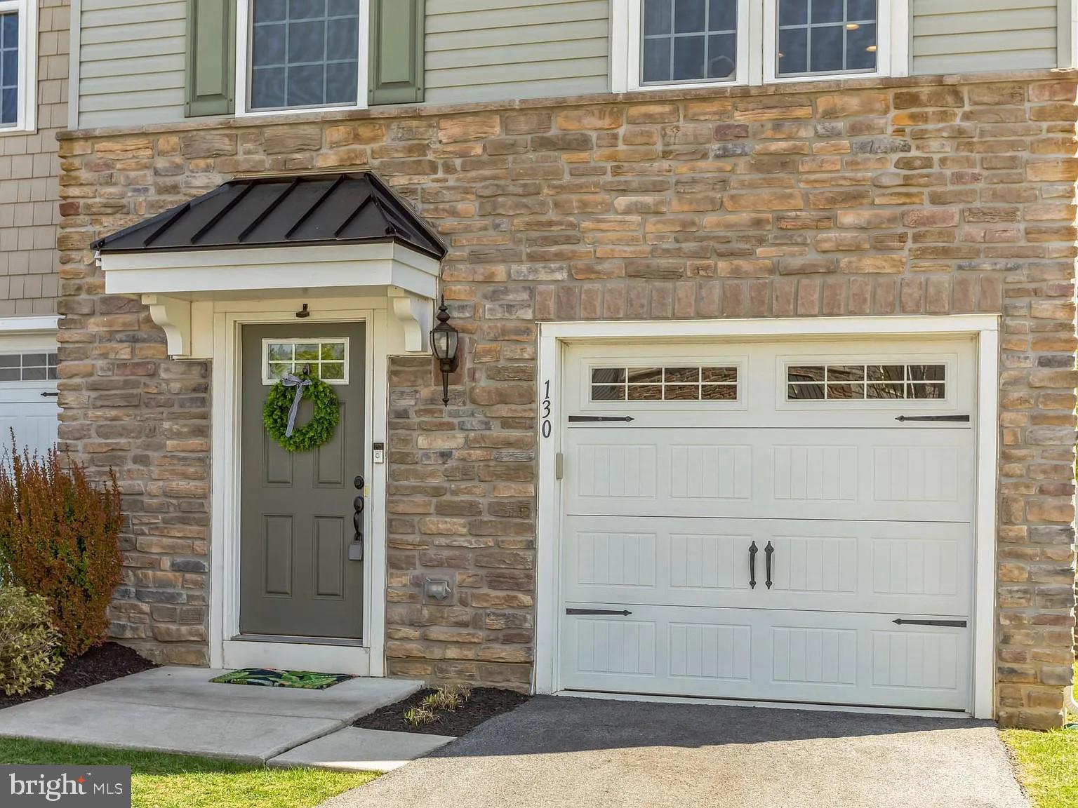 Welcome to an exceptional opportunity to own a premium end-unit townhome in Townes at Malvern community a prime location with convenient access to the Route 202 corridor. This move-in-ready home mirrors the original model with all the high-end upgrades and designer finishes. Offering nearly 2,290 square feet across three finished levels, this home features 3 bedrooms, 2 full bathrooms, and 2 powder rooms. Upstairs, the main living level showcases an open-concept layout with 9-foot ceilings, wide-plank hardwood flooring, and abundant natural light throughout. The expansive living room is accented by recessed lighting and flows seamlessly into the kitchen and dining areas. A nearby powder room includes an updated vanity for convenience. Upstairs, the main living level showcases an open-concept layout with 9-foot ceilings, wide-plank hardwood flooring, and abundant natural light throughout. The expansive living room is accented by recessed lighting and flows seamlessly into the kitchen and dining areas. A nearby powder room includes an updated vanity for convenience. On the top floor, you'll find all three bedrooms, including a stunning primary suite with a tray ceiling and ceiling fan, a generous walk-in closet, and an en-suite bath featuring a soaking tub, shower, dual vanities, and upgraded countertops. A hall bath and a laundry room with energy-efficient washer and dryer complete this level. Located in the highly ranked Great Valley School District, this home is also close to top-rated shopping and restaurants.