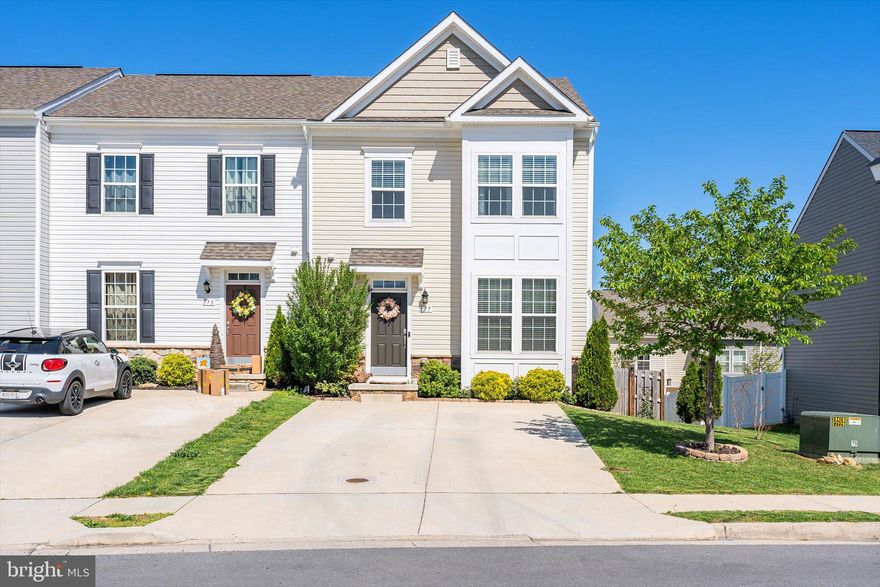 Step into the serene community of Archers Rock and discover 177 Ran Rue Drive, a captivating end unit townhouse crafted by Dan Ryan Builders in 2019. This inviting home boasts 3 bedrooms, 3 baths, and a fourth basement bathroom, awaiting your personal touch to completion. In the heart of the home, the kitchen beckons with an island, stainless steel appliances, and quartz countertops, while gleaming hardwood floors adorn the main level, bathing the space in natural light through expansive windows. Below, the fully finished basement showcases LVP flooring and a partially completed full bathroom, offering endless possibilities for extra living space. Outside, find solace in the fully fenced backyard, complete with patio decking and a spacious gazebo, ideal for hosting gatherings and creating cherished memories. Quick access to I-81 ensures effortless commuting, with both the Hedgesville and Spring Mills areas just a short drive away. Indulge in the vibrant local scene with nearby breweries, distilleries, and farm markets, offering a taste of the region's finest flavors and delights. Welcome home to a haven where comfort and style intertwine seamlessly.