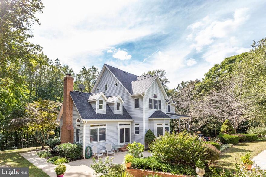 Don't let this opportunity slip away! This is an amazing custom-built home nestled on a serene, wooded 5-acre lot! Featuring 5 bedrooms, 3 1/2 baths, and a spacious kitchen, this colonial-style residence boasts hardwood floors, updated bathrooms, expansive wrap-around porches and an inviting pool area perfect for relaxing and entertaining. With its ideal floor plan and unmatched privacy, this rare find won't stay on the market for long. Seize the opportunity to call this remarkable property your own!