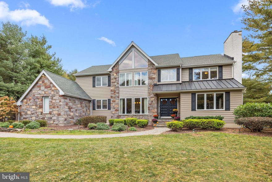 Elegant and Sophisticated! Two-Story Center Hall with Four Bedrooms and 2.5 Bathrooms situated on 1.5+ acres of picturesque grounds and located on a tree-lined street with cul-de-sac in the heart of Bucks County. Council Rock School District. 4200 square feet… considerable room sizes and expansive open floor plan for entertaining. Gourmet kitchen with white cabinetry, granite countertops, stainless steel appliances, designer range hood, subway tile backsplash, wall mount pot filler, and beverage center. Center Island with overhead pendant lighting and breakfast room with plenty of windows can double as a sunroom. Two floor-to-ceiling fireplaces with stone surround; one fireplace in the formal living room and fireplace #2 in family room accented with high cathedral ceiling, angled windows to maximize light and views, and ideally positioned off Kitchen with access to huge deck. Hardwood floors throughout the first and second floor. Dining room with recessed lighting and views of front yard landscape. First floor office and laundry room. Powder room with craftsman style Wainscoting. Master Bedroom with vaulted ceiling and sitting room overlooking front yard includes dressing area, walk-in closets and completely updated Master Bathroom with vaulted ceiling, oversized shower, deep soaking tub, two vanities and private deck with views of a well-manicured lawn with established trees, shrubs, and plantings. Upstairs are three additional nicely sized bedrooms sharing a newly renovated hall bathroom and having plenty of closet space. Lower level is partially finished as recreation room /playroom with wall-to-wall carpeting, drop ceiling, and panel lighting in addition is an abundance of storage in the unfinished area and steel Bilco doors to the outside. Oversized 3-Car Garage. Whole house generator. Recent updates include Roof, Siding, Skylight, Casement windows, Hardwood floors, Kitchen cabinets, countertops, tile work and appliances, Decorative moldings, Propane water heater, Hall bathroom, Split-rail fence, Interior doors, Well pump, Master bathroom, and Generator. Around the corner you will enjoy a Family-run farm offering produce, baked goods & preserves, plus pick-your-own fruits & vegetables.