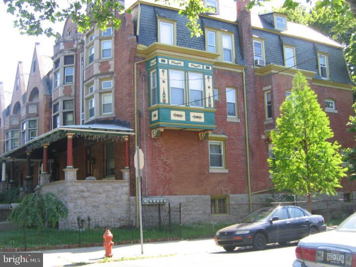 Dramatic bi-level apartment., available May 1, 2025. Dynamic Living Room with iron and oak Spiral Stair in one corner and a 6' closet in the other. The LR has huge, porch facing window and hardwood Floors. The LR connects to an Eat-in Kitchen that features a decorative fireplace with mantel and big mirror. Upstairs a 20'x25' bedroom has 11 newer windows with screens. Fully FURNISHED "As is". We are looking for International and other 'temporary' tenants who are best served with a Fully Furnished home. (Multi-month or1-3 year placements preferred) I do not want to have o import furniture nor store what is on site.
I have Allergies, so NO Pets & NO Smoking (of any kind)
and NO Strong Perfumes or CANDLES are allowed. Applicant must have good credit and sufficient income. This is currently also marketed aa an AirBnB, for those with shorter needs. This is a great building with 4 other apartments housing friendly long-term tenants who share the free basement Laundry, fabulous Porch, and front & side Yards. Heat, hot & cold Water and cooking Gas are included. All you pay is Wi-Fi and Electric. Free U.Penn Bus and SEPTA Public Transportation stop at the corner.