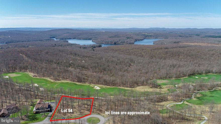 Don't miss this rare opportunity to own a premier building lot overlooking the 11th hole on the prestigious Lodestone Golf Course on top of WISP Mountain. Envision your mountain getaway boasting golf course frontage and perfect southwestern exposure on a quiet cul-de-sac. Take advantage of public water and sewer on site for an ideal building experience. The Lodestone community offers an idyllic setting for anyone looking to build in the Deep Creek Lake area. Call today for more information!