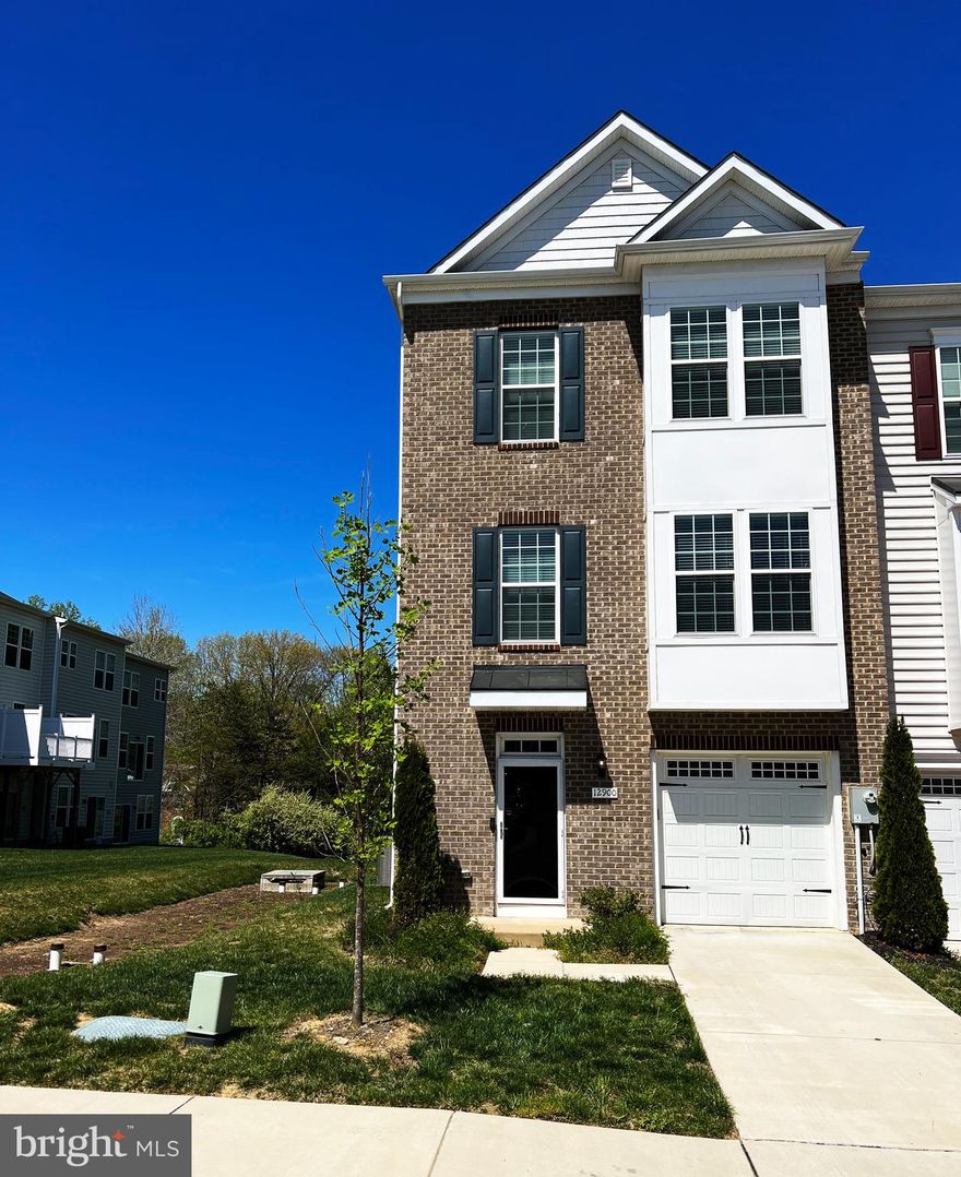 Alarm and monitoring system on the property>>> ABSOLUTELY STUNNING  End Unit Townhome with Brick front and side Elevation. Largest End Unit Model with close to 2700 Sqft of Luxury living space. Newly built in 2018 with upgrades galore featuring Open floor plan at its best with high ceilings and tons of Natural light, upgraded kitchen with Granite counter and 42inch cabinets, SS Appliances; Owner's Master suite with Vaulted ceilings, Large walk-in closets, stylish master bath featuring Luxurious Custom tiled surround; upper level Laundry room; upgraded fixtures; recessed lighting, custom 2-tone designer paint throughout; and list goes on.  Enjoy the Outdoors with Family on Your very own Dreamy Designer Deck open from kitchen area - Built for Entertaining!  Fully finished lower level with Full bathroom.  Prime location close to shopping, restaurants, and commuting routes, Perfect 10! You won't want to miss it!