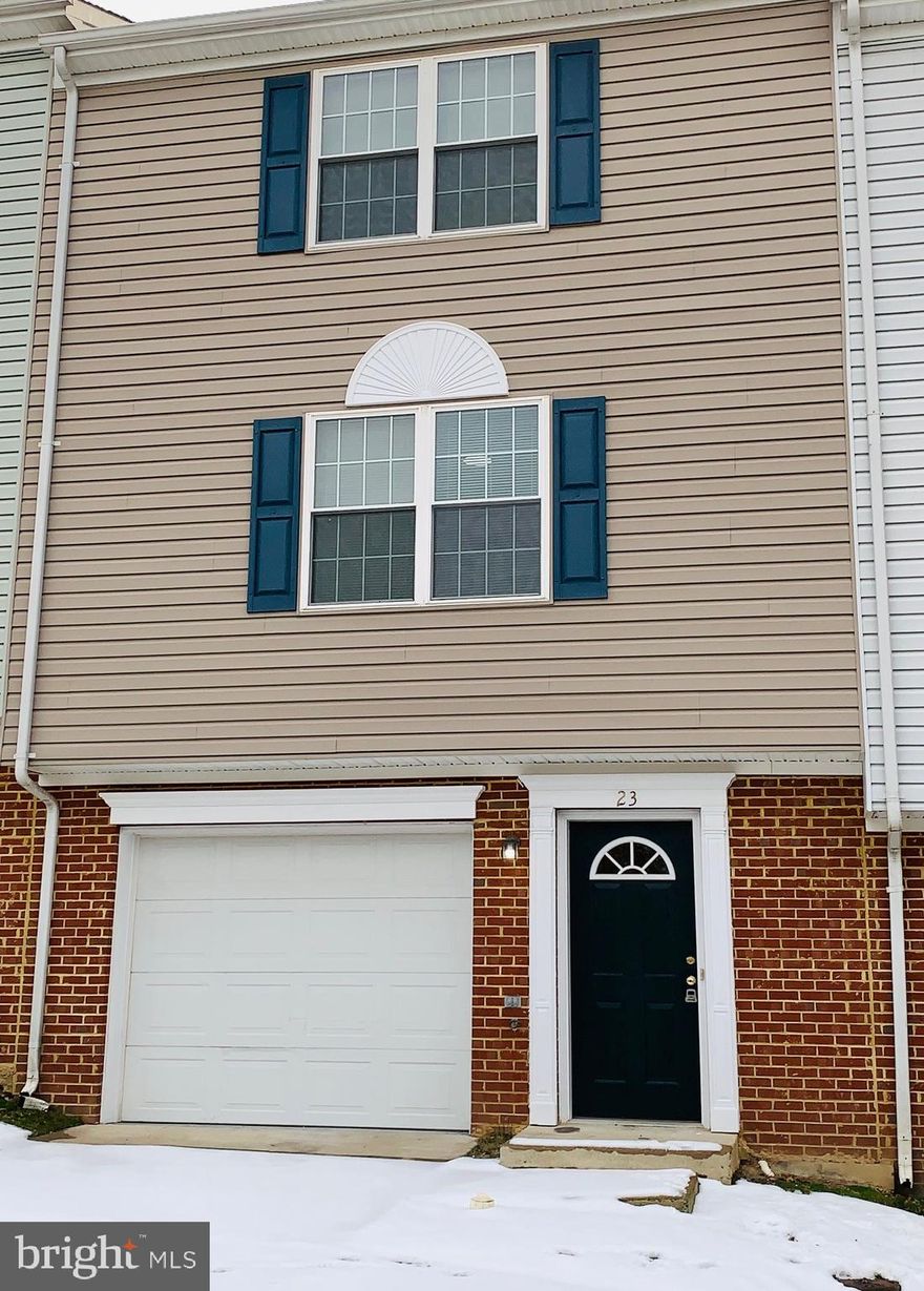 Gorgeous townhome in sought after, centrally located Stafford community! Just minutes from 95, courthouse, train station & so much more! As you enter on the lower level, come in thru either the front door or thru the 1 car garage.  There's also a huge laundry room with washer & dryer (w&d provided AS IS).  One floor up, on the main level you'll find a spacious floor plan that includes a LR, a walk-thru kitchen featuring an oversized pantry and also a separate formal DR with a half bath off to the side.  The top floor features 3 generous sized bedrooms and 2 full bathrooms.  Community amenities include a business center, pool, tot lot/playgrounds and 24-hour maintenance.  Vacant and ready for right away move in!