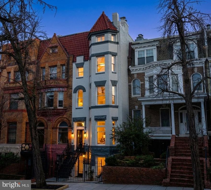 Experience the pinnacle of refined living in this newly reimagined architectural residence by William Andrew Homes. Ideally positioned along a one way, tree-lined street, and located in the sought-after Oyster-Adams school district, this extraordinary residence boasts 6 Bedrooms, 6.5 Bathrooms and approximately 5,071 square feet across 5 stories of impeccably finished living space. A true masterpiece, every detail has been meticulously crafted from the hand-picked Dekton stone selections, timeless Family Legacy Collection herringbone floors, designer lighting, the Artisan handmade staircase railings and balusters, custom curved doors, and bespoke millwork trim package that carries gracefully throughout the home. The main level unfolds with elegant Living and Dining rooms anchored by two of four wood-burning fireplaces, each appointed with custom Dekton stone mantels. At its heart, the gourmet Kitchen is a true showpiece–featuring custom-milled cabinetry by Studio37 Cabinetry, striking Dekton stone countertops, premier Wolf and Sub-Zero appliance package, and gorgeous glass enclosed wine cellar. Enjoy a convenient family room flowing effortlessly off the Kitchen for refined everyday living and entertaining. The grand architectural staircase, crafted by Century Stair Company, spans all four upper levels and showcases custom railings and balusters, serving as a sculptural focal point of the residence. Upper Level 1 is dedicated entirely to the luxurious Primary Suite–a private sanctuary complete with a spacious Bedroom adorned with specially imported designer wallcoverings, a lovely fireplace, expansive dressing suite, spa-inspired Bathroom, and private Balcony. Additional Upper Levels offer 3 generously scaled Bedrooms and thoughtfully designed Bathrooms, and a top-floor Sitting Room with floor-to-ceiling sliding glass doors that unveil a show-stopping Rooftop Terrace with panoramic city and monument views of Washington, DC. Multiple outdoor spaces–including 3 private decks and terraces feature Trex decking and custom metal railings–provide seamless indoor-outdoor living. This impressive residence is complete with 2 car secure parking with EV charger, 8 in-ceiling Sonos speakers, top-of-the-line security package with custom-fabricated metal front gate, secure roll-up garage door, high-tech Brivo security keypad and Ring video doorbell systems and is finished with premium HVAC systems to provide consistent comfort across all levels. The fully finished Lower Level offers exceptional flexibility as a private guest retreat or income-producing opportunity. With 2 Bedrooms, 2 full Bathrooms, a full-size Kitchen with Dekton countertops and stainless-steel appliances, dedicated smart Washer/Dryer, and both front and rear entrances, the space conveys with a certificate of occupancy for added versatility. With meticulous attention to detail and no expense spared, this showpiece residence is sculpted to perfection, seamlessly blending timeless architecture, modern luxury, and thoughtful functionality in one of Washington’s most prestigious neighborhoods. OPEN HOUSE SATURDAY, 2/21 from 1-3PM!