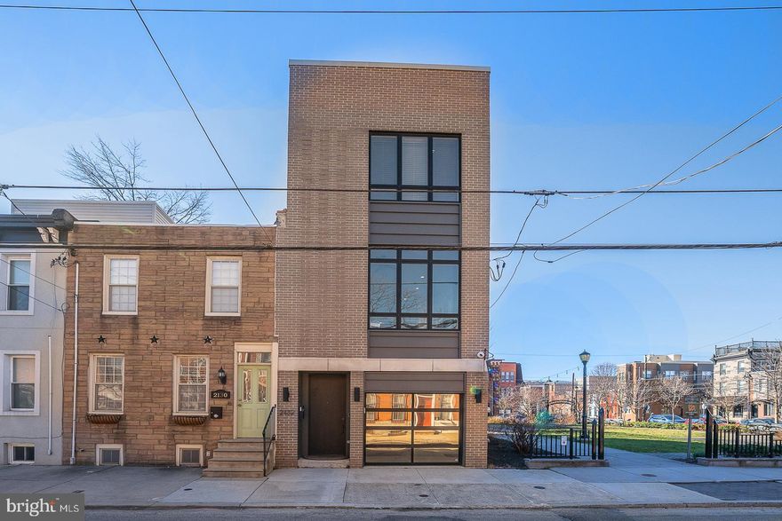 Welcome to 2132 Montrose Street in the heart of Graduate Hospital!  This newer, end of row, 3 bedroom/3 bath modern home, built in 2016  features a ground floor level with 2-car heated garage, a flex/office space and cozy fenced in outside patio. Tax abatement is valid until December 2026.
 
The main floor features a sophisticated  kitchen with 48 inch white shaker cabinetry, Frigidaire Professional stainless appliances, an elegant quartz breakfast bar with seating for 4, a light filled dining and living area with glass sliders overlooking the Julian Abele Park, a  welcoming gathering and socializing area for the neighborhood.  The living and dining area is complete with  surround sound and built-in speakers, a perfect place to entertain. A guest room and full bath complete this main floor.

The next level has a picture perfect view of the Philly skyline from the principal bedroom, which boasts ample closet space, an  ensuite full bath with floor to ceiling tile, enclosed glass shower with dual shower heads, double vanity and  heated floor. Third bedroom  is also on this level with another full bath as well as washer/dryer laundry closet.

On your way up to the amazing roof-top deck you will find a wine fridge and sink . The large deck provides more spectacular views of not only the center city skyline, but also east, west and southern views. Star gazing has never been easier!  To top off this dreamlike deck, there is a hot tub. This outdoor deck  is TV- ready with a Sonos speaker. A technology package includes a hardwired camera system, Google Nest video doorbell, three zone Sonos system, SimpliSafe security system, access to the garage from your smart phone, dual zoned HVAC run by Nest.

Graduate Hospital area is a highly sought after neighborhood because of its proximity, walkability and bikeability to Center City, Rittenhouse Square, University of Pennsylvania, Hospitals and research centers, Jefferson Hospital, Drexel University, Pennovation as well as cultural venues
and dining.
