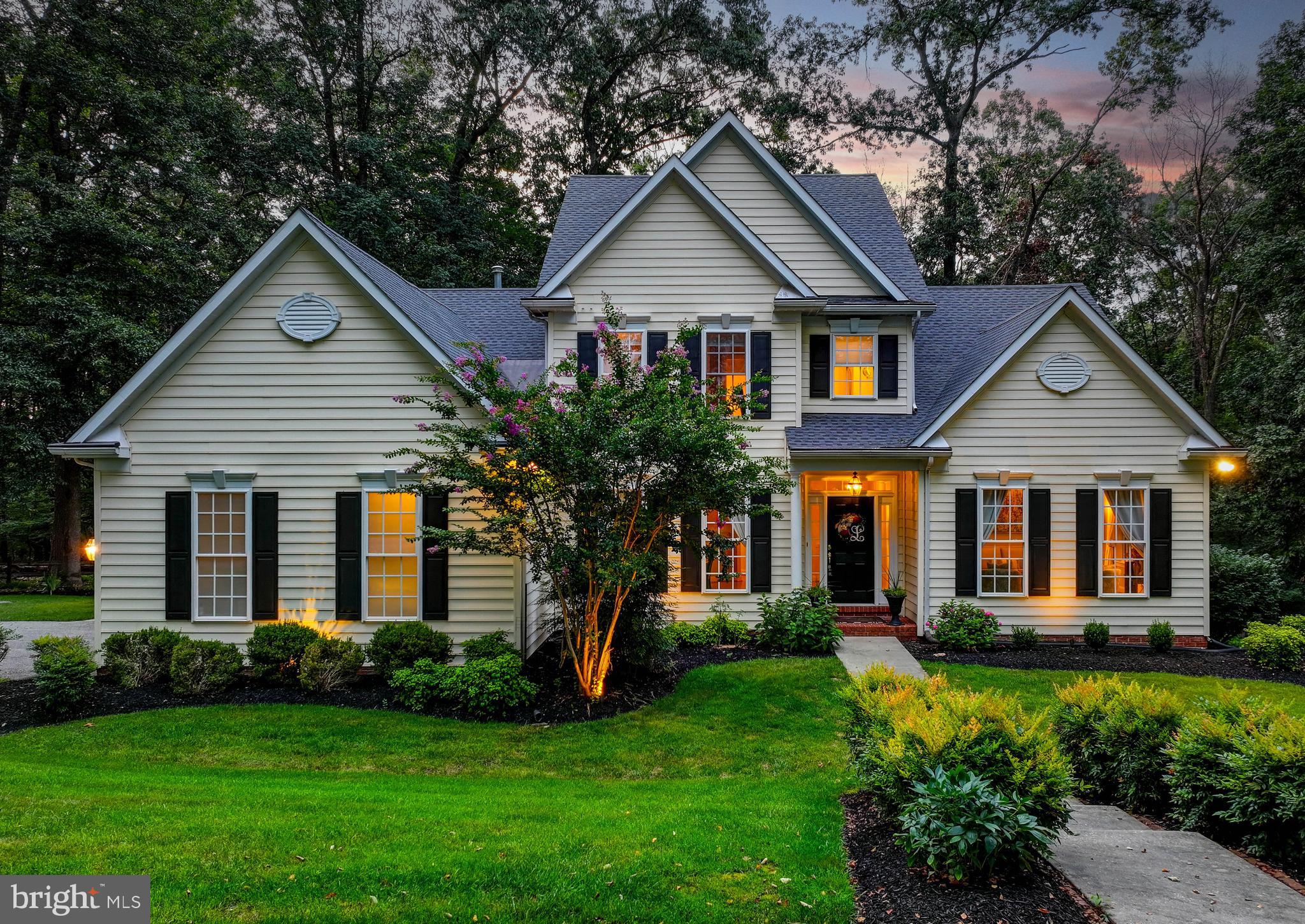 Live authentically. Welcome home to this private retreat located on 6+ acres of park-like living in the Hereford Zone. Upon arrival, you find the house framed perfectly by the surrounding woods as the circular drive invites you in. Be pampered by the first-floor primary suite complete with a glass enclosed shower, a separate soaking tub, dual sink vanity, and a walk-in closet. The granite kitchen opens to the breakfast area and family room for entertaining friends or quiet evenings home with the family. The finished basement expands your living space, offering an ample recreation room filled with natural light, a home office or gym, and a full bathroom. Connect with nature and embrace the idyllic back yard from the rear deck and just below on the stone patio off the walk-out basement. Hereford School District. Convenient to Hunt Valley. Cycle out the front door. Roof replaced in 2024. Dual zoned, heat pump and lower A/C new in 2023. EV Charger (Tesla). Xfinity internet. Cultivate your existence. The art of uniting human and home.