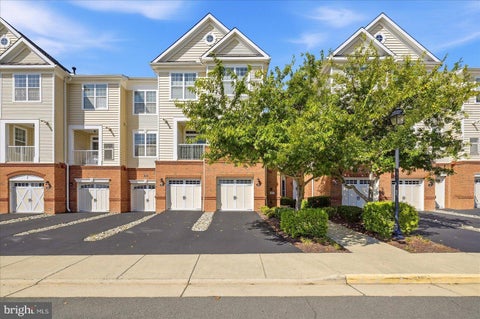 Photo of 23297 Southdown Manor Terrace #106, ASHBURN, VA 20148 (MLS # VALO2136626)
