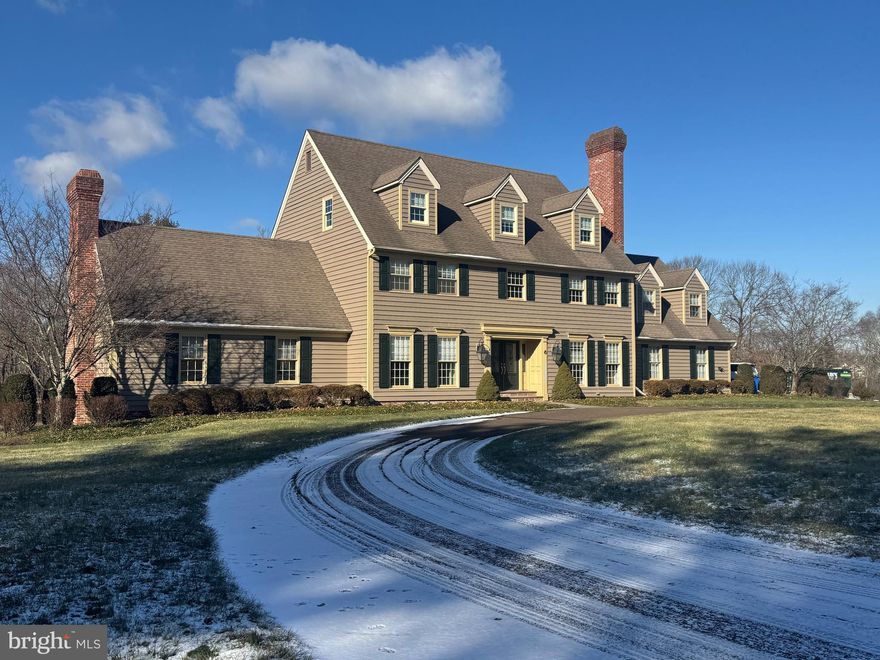 The residence of one of Bucks County' s old world craftsman, David J Schrenk is offered for the first time on the market.  Set on a private cul de sac, this Bucks County Traditional home sits majestically on a 5+ acre lot but yet is connected to a neighborhood.  The floor plan consists of a large Gathering Room with floor to ceiling stone fireplace, Breakfast Room with 3 sides of windows, Formal Dining Room, Private Study with fireplace,  Large Primary suite with Sitting Room, walk in closets, elevator and bath, 2 additional bedrooms and hall bath on second floor, Third floor has 2 more additional bedrooms and full bath on third level. Finished Lower Level with outside staircase, in-ground pool & spa, detached 3 car garage with pool changing room and bath. Sol Feinstone Elementary. Minutes from Newtown, Princeton and the I - 295 corridor.