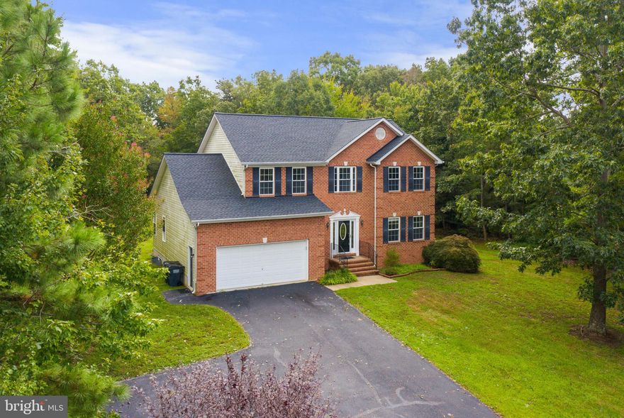 Located in the sought-after Kingston community, this brick-front colonial home is a standout on its spacious 1.4-acre lot. The residence proudly presents 4 bedrooms and 3.5 bathrooms. The backyard promises both privacy and natural beauty. The lot backs to trees and includes a large deck, perfect for relaxation and outdoor gatherings.

The main level is accentuated with hardwood floors and leads to a well-appointed kitchen complete with island and stainless-steel appliances. The adjacent family room is ideal for relaxed evenings. Furthermore, a mud/laundry room offers added convenience, directly accessible from the 2-car garage.

The upper-level primary bedroom features an en-suite bathroom fitted with a soaking tub and a separate shower. Meanwhile, the finished basement has new carpet throughout and brings versatility to the table. Down here, you'll find potential office space, a large flex room, a recreation room and an additional full bath.

The perks don't stop with the house alone. The Kingston community amenities include a pavilion and ball fields, enhancing the lifestyle and leisure options available to residents.

Location-wise, this home offers unparalleled convenience. Just minutes away, you'll find dining, shopping, and entertainment in both Leonardtown and California. Those working at NAS PAX River will be pleased with the easy commute. Additionally, the property is a stone's throw from Leonardtown Middle & High Schools and Abell's Wharf boat ramp, granting access to Breton Bay and the Potomac River.

Blending comfort, convenience, and community, this home in Kingston is a must-see. Schedule your visit today!