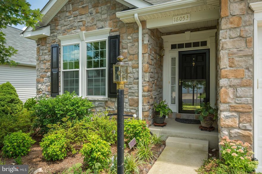 Immaculate stone front home located in the 55+ active adult community of Four Seasons.  This spacious and light filled 2 level home features 4 bedrooms and 3 full baths.  Beautiful hardwoods on the main level and carpet on the lower level.  Kitchen features quartz countertops and backsplash; upgraded cabinets and lighting; stainless steel appliances; sunny breakfast nook overlooking the cozy family room with a gas fireplace and walkout to a trek deck perfect for an afternoon barbecue or an evening get together with family and friends. Master bedroom with custom bath; large doorless walk in shower;  heated bathroom floor; upgraded cabinets and counters with dual sinks.  Lower level features an oversized rec room; craft/hobby room; custom bath and bedroom; wine room; large storage room; walkout to stone patio overlooking mature trees and common area.  Most windows are triple pane; tankless water heater; Tyvek and insulation wrap on house; 2 car garage; and so much more.  Awesome club house with indoor and outdoor pools, tennis, exercise classes, nature trails and more.  Close to I-95, shopping and restaurants.Come see this beautiful home, you will not be disappointed!  Your dream home awaits you!