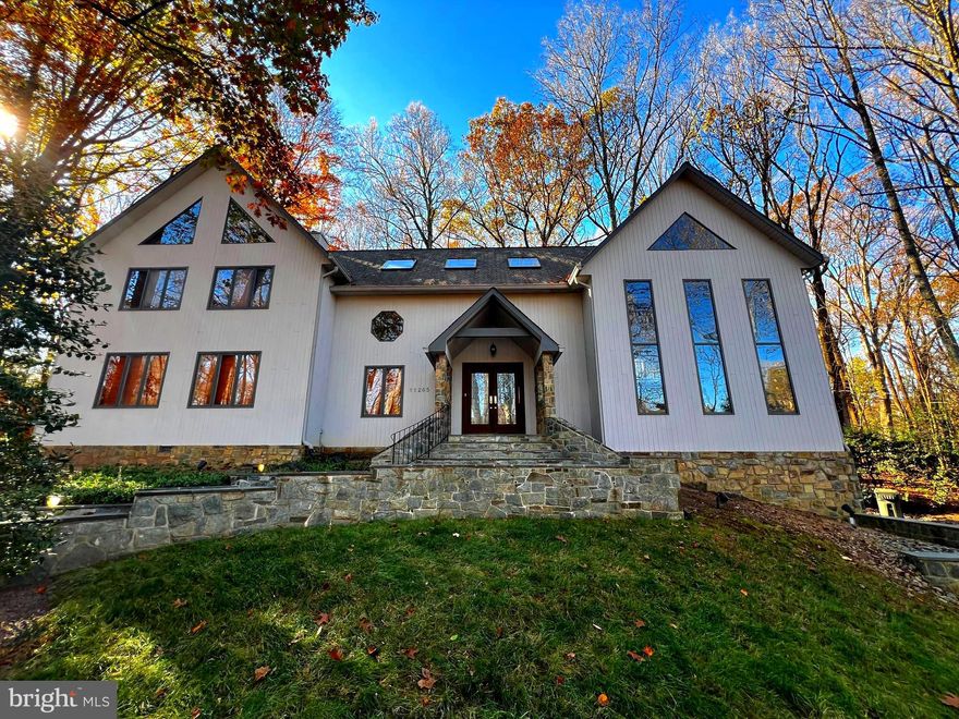 NEW PRICE!!! Freshly professionally cleaned & exterior pressure washed!
Stunning Great Falls Retreat with Exposed Beam Cathedral Ceilings & Expansive Wooded Views
Nestled on a breathtaking 2-acre wooded lot, this exceptional home in Great Falls, VA, seamlessly blends rustic charm with modern comfort. Boasting exposed beam cathedral ceilings and two-story windows, this home is flooded with natural light and offers serene views of the surrounding landscape. ***** Inside, you'll find hardwood floors throughout the main level, stained wood doors, and three beautiful wood-burning fireplaces, creating a warm and inviting ambiance. The huge kitchen is a chef’s dream, flowing into a spectacular octagonal bonus room, perfect as a breakfast nook or cozy reading retreat. ***** This home features three large bedrooms, each with an en-suite bath, plus two spacious lofts for added flexibility. The first-floor bonus room serves as an office or optional fourth bedroom. The owner’s suite boasts a luxurious soaking tub, ideal for unwinding. ***** Step outside and enjoy three expansive decks, extensive hardscaping and stone walls, and a large shed for extra storage. The home has been freshly painted inside and out, with new carpet in the basement, bedrooms, and lofts. ***** Whether you’re relaxing by the fire, entertaining in the spacious living areas, or enjoying the natural beauty surrounding your home, this property offers an unparalleled lifestyle in one of Northern Virginia’s most sought-after locations. *****📍 Key Features:
✔ 3 Bedrooms + 2 Lofts + Bonus Room (Office/4th Bedroom) -- 
✔ 3 Wood-Burning Fireplaces -- 
✔ Huge Kitchen & Octagonal Breakfast/Reading Room -- 
✔ Newly Painted Interior & Exterior -- 
✔ New Carpet in all Bedrooms & Basement -- 
✔ Main HVAC System Replaced in 2022 -- 
✔ Bedroom Level HVAC System Replaced in 2025 -- 
✔ Roof & Gutters Cleaned in Fall 2024 -- 
✔ 3 Expansive Decks & Extensive Hardscaping -- 
✔ Large Shed for Extra Storage ***** Experience the best of Great Falls living—schedule your private tour today!