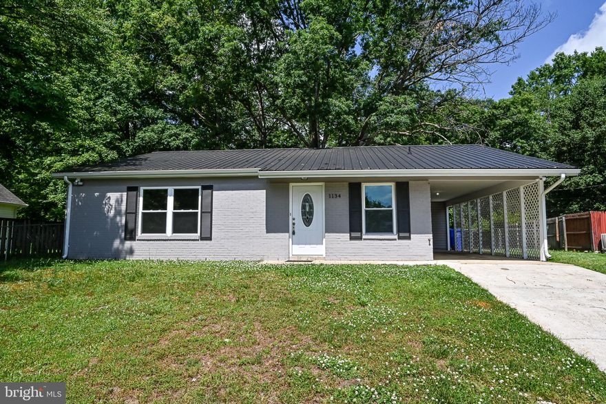 Welcome home to this fully renovated beauty! Updated kitchen with new cabinets and stainless appliances. 3 bedrooms and 2 full baths with new flooring, lighting, tile, vanities, and more. Don't miss the large yard and covered parking.