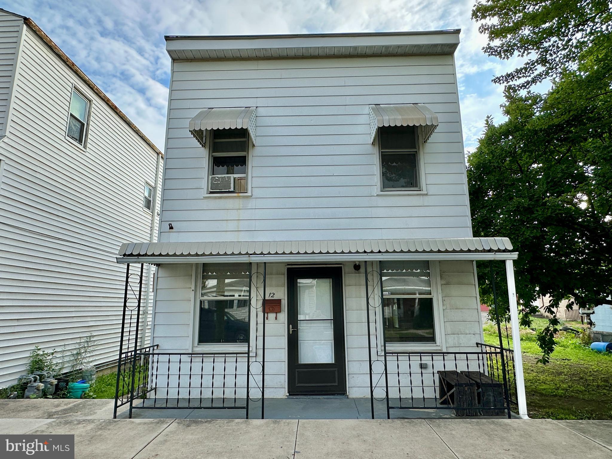 Welcome to 12 Humbird Street! This affordable 2-bedroom, 1-bathroom home is a great opportunity for investors or owner-occupants. The main level features a spacious living room, formal dining room, and a kitchen with newer appliances and a washer/dryer. A large walk-in closet offers additional storage. Upstairs includes two large bedrooms—one with a walk-in closet—and a full bath. Enjoy a fenced-in backyard and an off-street parking pad that accommodates up to 3 vehicles. With a reasonable offer, Sonny's Transfer will move the buyers in within a 25 mile radius. SOLD IN AS IS CONDITION. Call today- this home will not last long!