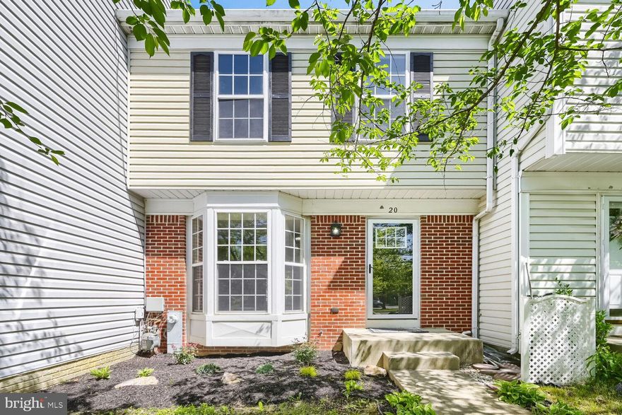 Fully renovated and move-in ready, this 3 bed, 2.5 bath townhome stands out with high-end finishes and a clean, modern feel throughout. The kitchen is the showstopper — featuring gorgeous quartz countertops, new white cabinetry, stainless steel appliances including a gas stove, plus designer tile and upgraded lighting that elevate the entire space. It opens seamlessly to the dining area, making everyday living and entertaining effortless. The main level also offers a spacious living room and updated flooring throughout.
Upstairs, you’ll find three bedrooms, including a primary suite with a beautifully renovated bathroom featuring designer tile and a walk-in closet with a custom system. Fresh carpeting runs throughout the upper level, giving it a crisp, move-in ready feel. The finished walkout basement adds valuable flex space — perfect for a guest room, home office, or gym — along with an additional full bathroom. Out back, enjoy a landscaped setting with mature trees that create a quiet, private feel. All of this in a convenient location near shopping, dining, and major commuter routes.