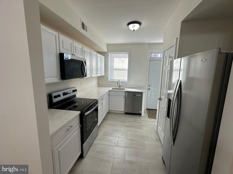 WELCOME to 1220 N POTOMAC ST where character, comfort and convenience all come together nicely.  This updated three level rowhouse features modern touches throughout at a very competitive price.  Home features beautiful upgrades including new laminate wood flooring, SS appliances, quartz countertops, gourmet kitchen with pantry & new white cabinets, separate & versatile dining & living rooms, ceramic wall & floor tiles, upgraded bathroom, electrical heavy-up, freshly painted walls throughout, new HVAC & HWH, new carpeting on 2nd floor and covered front porch for people watching and winding down.   Top level of the home includes 2 spacious bedrooms with one pass thru bedroom for a total of 3.  Basement can be used for entertaining and storage with interior and exterior access with a washer & dryer hookup. The entire neighborhood is booming with development and revitalization and the prices of houses are skyrocketing so you will have instant equity at the favorable asking price!  Conveniently located to just about everything and it is cheaper than renting.  Great opportunity for the first time homebuyer or investor looking to add to their rental portfolio for positive cash flow.   All you have to do is bring your furniture and electronics with you and move in.  Please call the helpful LA with any questions and to schedule an appt.