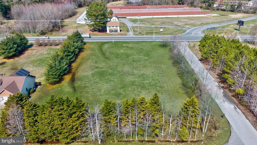 Discover an exceptional opportunity with this vacant parcel of land located at 22882 Lewes Georgetown Hwy, Georgetown, DE. Situated along the bustling Route 9, this property boasts commercial land use, offering endless possibilities for entrepreneurs, developers, or investors looking to capitalize on its prime location and versatile zoning.
 
Perfectly positioned in Georgetown, this parcel provides easy access to a variety of nearby towns and attractions. Just 15 miles to the east from the charming town of Lewes and 10 miles from downtown Milton. For those seeking convenience, the property is also a short drive from key points of interest, including the Georgetown Circle, Sussex County Courthouse, and local amenities like schools, healthcare facilities, and shopping centers.
 
With its strategic location along Route 9, a major thoroughfare connecting inland Delaware to its iconic coastal destinations, this commercially zoned lot is ideal for a range of ventures—whether it’s a retail establishment, office space, or service-oriented business. The flat, open terrain of this approximately 1-acre parcel offers a blank canvas to bring your vision to life, all while benefiting from high visibility and steady traffic flow. Don’t miss your chance to invest in a property with such promising potential in the heart of Sussex County!