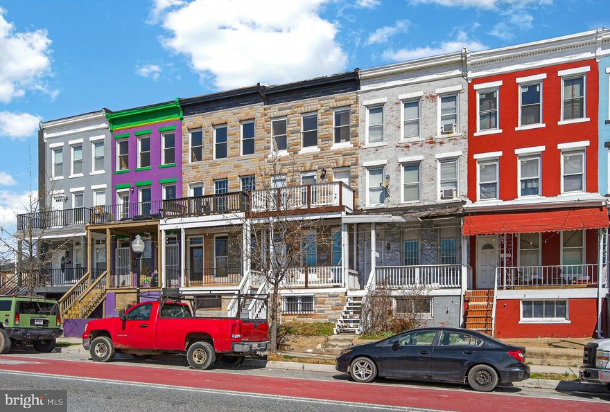 Welcome to this beautifully renovated home offering three fully finished levels of modern living in the heart of Baltimore City!  4 bedrooms, 3.5 bathrooms, The main level features an inviting open, concept layout highlighted by a stunning electric fireplace, perfect for relaxing or entertaining. The brand new kitchen, complete with quartz countertops, custom backsplash, peninsula seating, modern lighting, and sleek finishes, along with a convenient half bath. The second level boasts a private balcony and a primary suite alongside an additional bedroom, while the third level offers two more generously sized bedrooms with a full bathroom this is ideal for family, guests, or a home office setup. The unfinished basement provides abundant space and endless potential for future customization. Additional upgrades include new windows, dual HVAC systems, a new water heater, and updated electrical for peace of mind. fully fenced backyard. Don’t miss this incredible opportunity to own a move-in-ready home in a highly accessible Baltimore City location. Schedule your private tour today and make 1762 E North Ave yours!