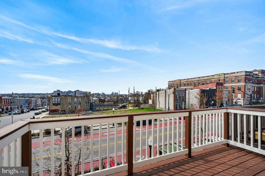 Welcome to this beautifully renovated home offering three fully finished levels of modern living in the heart of Baltimore City!  4 bedrooms, 3.5 bathrooms, The main level features an inviting open, concept layout highlighted by a stunning electric fireplace, perfect for relaxing or entertaining. The brand new kitchen, complete with quartz countertops, custom backsplash, peninsula seating, modern lighting, and sleek finishes, along with a convenient half bath. The second level boasts a private balcony and a primary suite alongside an additional bedroom, while the third level offers two more generously sized bedrooms with a full bathroom this is ideal for family, guests, or a home office setup. The unfinished basement provides abundant space and endless potential for future customization. Additional upgrades include new windows, dual HVAC systems, a new water heater, and updated electrical for peace of mind. fully fenced backyard. Don’t miss this incredible opportunity to own a move-in-ready home in a highly accessible Baltimore City location. Schedule your private tour today and make 1762 E North Ave yours!