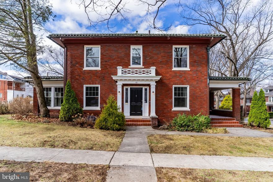 Timeless Elegance in Bellevue Park!

Welcome to this stately 1910 red brick home, gracefully situated in the coveted Bellevue Park neighborhood of Harrisburg. Meticulously cared for with its classic Italian tiled roof and exquisite architectural details, this residence offers a seamless blend of historic charm and modern convenience.

Step through the front entrance into a welcoming vestibule that leads to a grand foyer, where rich original hardwood flooring, intricate wood moldings, and 6-inch baseboard trim set the stage for timeless elegance. To the left, 18-light French doors with beveled glass open to the formal dining room, a masterpiece of craftsmanship featuring a striking wood coffered ceiling, wainscoting, and a built-in corner cabinet with glass inlay. Beyond, another set of French doors leads to a sunroom  with original tile flooring, an ideal retreat filled with natural light.

To the right of the foyer, a third set of French doors reveals the expansive living room and den, anchored by a stately wood-burning fireplace. This inviting space seamlessly extends to a covered patio through yet another set of elegant French doors, creating a perfect flow for indoor-outdoor living.

The beautifully updated kitchen preserves the home’s character while offering modern functionality. It boasts soft-close cabinetry, granite countertops, a pull-out trash compartment, and a wine and coffee station with upper glass-front cabinets and built-in storage below.

Ascending to the second level, you’ll find four spacious bedrooms, each with walk-in closets. The primary suite features a private ensuite bath, while the second bedroom enjoys direct access to the second full bath, which also serves the main hallway.

Lovingly maintained and thoughtfully updated over the years, this remarkable home boasts replacement Pella windows, updated electrical, a new central air system, gas boiler, and hot water heater—all ensuring contemporary comfort without compromising its historic allure. Additionally, an attached two-car garage and extra off-street parking provide convenience and flexibility. A rare opportunity to own a piece of Harrisburg history, this Bellevue Park treasure is ready to welcome its next fortunate owner.

Schedule your private tour today and experience the timeless beauty of this extraordinary home.