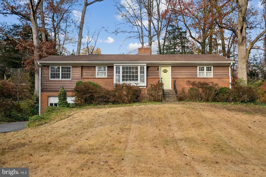 PRICE REDUCED!! Open House Sunday December 14th 1-3.Welcome home to 1912 Kimberly Road!! This sunny 5 bedroom, 3 full bath, 3000+ square foot expanded rambler is situated on a 1/3 of an acre lot in the heart of the sought after neighborhood of Old Hillandale.  A flagstone walkway takes you to the entrance where you will be met by hardwood floors, a wood burning fireplace and portrait window in the oversized living room and dining room. Off of the dining room is the main level family room which has an exposed brick wall and windows galore letting in the natural light. The kitchen with its updated countertops and classic subway tile backsplash has plenty of counter and cabinet space, plus a pantry.  The primary bedroom is host to a private en-suite bath and walk-in closet.  Four more generous sized bedrooms and a second full bath complete the main level. The lower level is home to a recreation room with a second wood burning fireplace, a large combination laundry room/workshop, two additional rooms, which could be used as home offices among other things, a full bath and access to the garage.  Recent improvements include 2025 - New hot water heater, vanities in both upstairs bathrooms, paint.  Convenient to 95/495, University of Maryland, FDA, Goddard, shopping and restaurants.