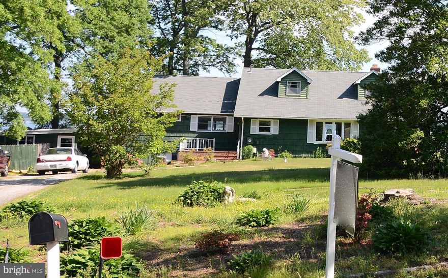 Listed and Sold simultaneously.   For Comp Purposes only.   Large lot with breathtaking views--Sought after Loch Haven --Property is habitable.   Would be a great location for renovation or new construction