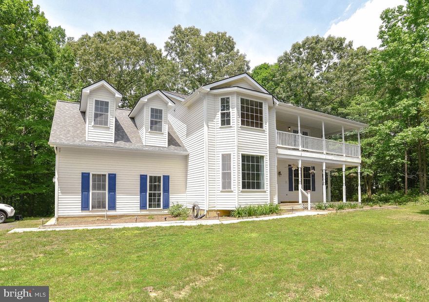 Fresh Paint,  Insulated Garage, Central Vac, Heat pumps with propane back up, Refinished wood floors, New Carpet, Bay Windows, Tile Floors, Granit Counter Tops, Great Wrap Porches on Main level and off Primary Suite, Deluxe bath, Laundry on second floor, Real Fireplace, Septic updated, New Roof, and on and on. What more do you need to just move on in! Private location on over two acres and no HOA.