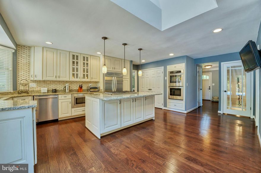 Offer Deadline Monday, 6:00pm
Welcome to your dream home in Great Falls, Virginia! This exceptional Dutch Colonial estate sits on nearly two acres of verdant land, offering an exquisite mix of seclusion and natural splendor.

Inside, you will be stunned by the remodeled kitchen, featuring a professional grade 6-burner cooktop with downdraft, a double oven, two spacious pantries, custom cutlery drawers, and a large island—perfect for both intimate family dinners and grand gatherings. 

With two conveniently located laundry rooms (one on the main level and one upstairs), household chores will be a breeze, leaving you more time to enjoy the home's luxuries. The finished basement provides versatile living space, ideal for a home gym, game room, or cozy movie nights. 

The highlight of the property is the sparkling pool, framed by beautiful gardens and surrounded by windows offering stunning views of the outdoor space. The oversized 3-car garage adds to the home's appeal. 

This residence blends luxury and practicality in a picturesque setting and is conveniently close to all amenities. Don't miss this rare opportunity to make this gem your own—schedule your showing today