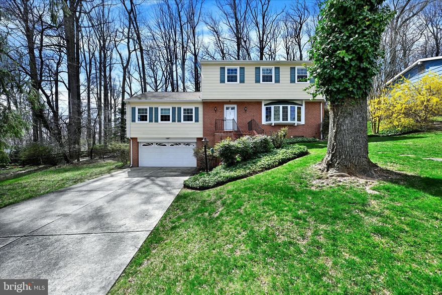 --Welcome to this exceptional 4 bedroom, 3 bath home nestled in the charming Valley Wood community. Boasting a sought-after main floor bedroom with a full bath, this residence offers both convenience and comfort. As you step inside, you're greeted by a welcoming foyer featuring new flooring, setting the tone for the rest of the home. To the right, the spacious living room beckons with its abundant natural light streaming in through the bay window, creating a perfect spot to showcase your favorite houseplants.
--Adjacent to the living room, the sizable dining room eagerly awaits your next dinner gathering, while the kitchen offers ample space for everyday meals, complete with access to the cozy brick patio out back for enjoying your morning coffee. A hallway, accessible from both the foyer and kitchen, leads to the main floor bedroom with bath access and the stunning main floor family room. Imagine cozy evenings by the fireplace, surrounded by a wall of windows that overlook the lush backyard, providing a tranquil retreat.
--Upstairs, the main bedroom awaits with its double-wide closets and ensuite bath, featuring a separated vanity area with additional double closets and a newly renovated shower/commode room. Two additional bedrooms are serviced by a hall bath with a tub/shower combination.
--Downstairs, the lower level hosts the washer/dryer and utilities, presenting a clean and neat space ready for your personal touches. From here, you can access the 2-car garage and the backyard, which offers ample room for outdoor enjoyment, including a patio, play areas, and serene privacy among the trees. Plus, with the property backing to Baltimore County land, you'll enjoy the added benefit of no direct neighbors at the back. 
--Don't miss out on the opportunity to make this your next home! Schedule a viewing today.