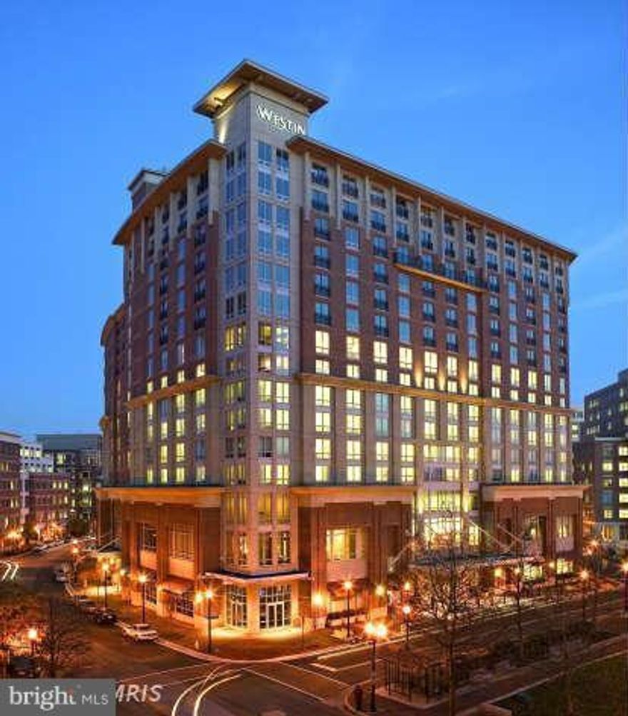 Stunningly beautiful large 1 BR and DEN in a boutique condo above the Westin Hotel. Enjoy wood floors, gourmet kitchen (granite, SS appliances, dual sink, breakfast bar), large windows for lots of light, granite bathroom vanity & more. Gym/Pool, room service & Maid Service offered for a fee. Walk to Metro, shops, restaurants, movies (above a Starbucks) etc. 1 garage/1 storage space included