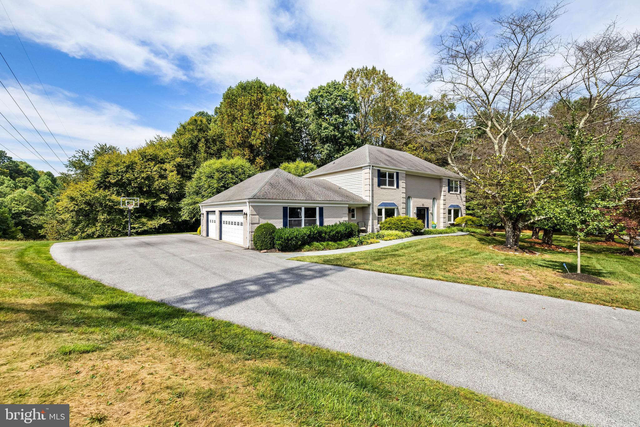 Beauitfully updated house in the desirable gated community of Overlook with 5bd/3 full and 2 half baths. Backs to the Loch Raven Reservoir and has a walking trail down. Gorgeous bluestone patio and fire pit for outdoor entertaining. Exterior has been modernized with paint, new front door, back sliding doors and new lighting. Gourmet kitchen with lots of cabinetry and sunlight. All hardwood floors have been restained throughout. Foyer has new tile and new carpet all upstairs and in lower level. Office was custom built in 2018. Laundry room and pantry redone in 2025. Water heater replaced in 2025. Lower level HVAC is 2025. All windows replaced by previous owners just prior to them moving in. Driveway was repaved three years ago. Three car oversized garage has an apozy floor that was done 3 years ago. Do not miss this move in ready home!!