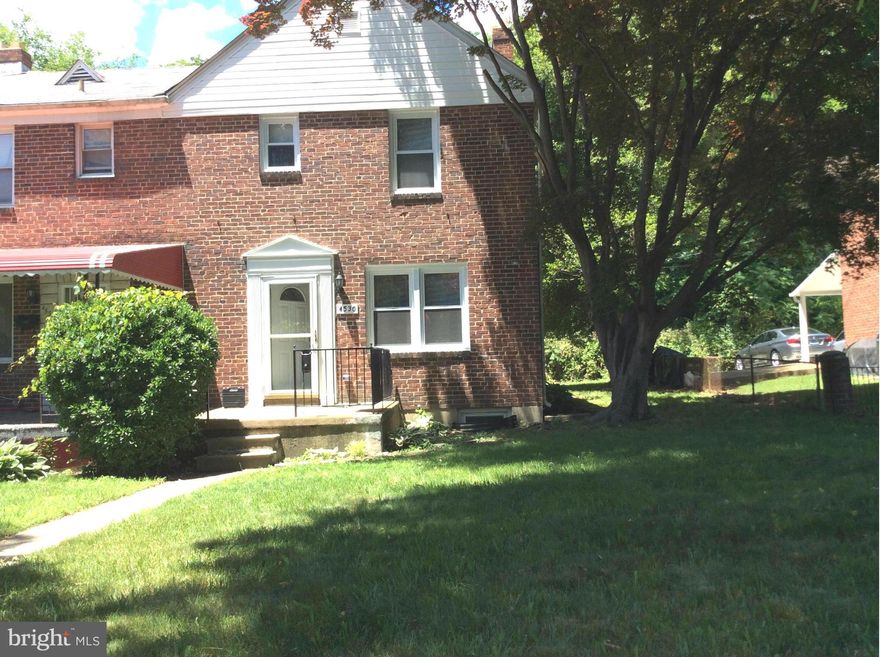 Great Opportunity to own "Nicely Redone End of Group Townhome" Near Ten Hills. New windows with lots of natural light. Updated kitchen and bathrooms. Gleaming hardwood floors, freshly painted throughout. Large rear yard faces private back, that is great for entertaining. Home maybe eligible for Baltimore City Vacant to Value Grant of $10,000. Home comes with One Year Warranty.  Won't Last!!