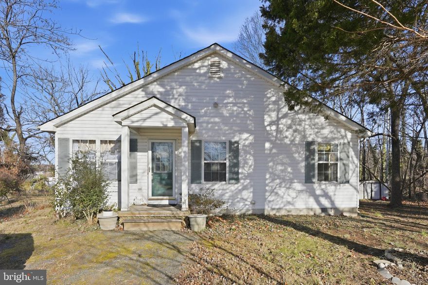 Charming single-family residence offering 1,444 square feet, 3 bedrooms, and 2 full bathrooms with water views of Neale Sound on picturesque Cobb Island. Step inside to a spacious and open main level, where vaulted ceilings and dual ceiling fans enhance the bright and airy combined living and dining room. This inviting space flows into a cozy sunroom with views of the garden and the water, along with access to the lush backyard, perfect for relaxing or entertaining. The eat-in kitchen features generous cabinet and counter space, a breakfast bar, a floral tile backsplash, and a sunny breakfast nook. Just off this space is the private primary suite, complete with a walk-in closet and an attached full bath with an oversized vanity. Down the hallway near the front entry are two additional well-sized bedrooms, a centrally located second full bathroom, and a pantry/storage closet. Located just blocks from water access, this home is ideal for boating, paddleboarding, kayaking, and other water sports. Cobb Island residents also enjoy access to a charming community park with a playground, the waterfront Scuttlebutt Restaurant & Marina, a local market, and a post office—everything you need for laid-back coastal living. Please note that the HVAC now needs to be replaced, which is reflected in the price reduction.