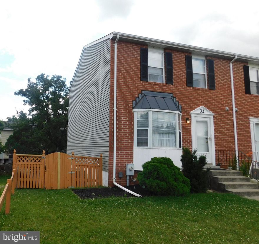 Charming end of group townhouse in Oakhurst. Eat in kitchen, formal dining room, sunken living with sliders to deck and powder room on main floor. Three bedrooms and 2 full baths upstairs. Finished basement with sliders to patio and fenced in yard. Another powder room and a playroom in basement. Convenient Area, close to shopping!