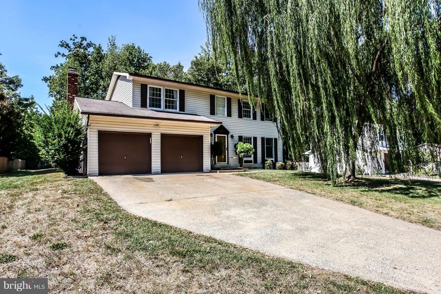 Huge home on amazing flat/private lot that's loaded w/ upgrades. Entire main lvl w/ hardwood floors, updated fixtures & custom paint. Gourmet kit w/ upgraded appliances, flooring, back-splash, counters & cabinets. Great breakfast nook with private views of flat fenced yard. Family RM w/ fireplace & walk out to patio. 5 large bedrooms upstairs & 6th BR in basement (NTC). Huge basement w/ 2nd kit.