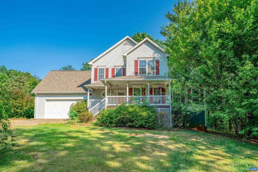 This beautiful home offers a combination of modern comfort and rustic elegance, providing an ideal retreat for those seeking a peaceful lifestyle and is nestled in a serene and picturesque setting. Situated on a spacious 3 acre lot, the home showcases the natural beauty of the surrounding area. The exterior features a blend of traditional and contemporary architectural elements, with a welcoming front porch and a well-maintained lawn. Upon entering the home, you are greeted by a warm, large foyer. The living room and dining room are bathed in natural light, thanks to large windows that offer stunning views of the outdoors. It provides a cozy space for relaxation or entertaining guests. The kitchen is a chef's delight, boasting modern appliances, ample countertop space, and custom cabinetry. It is perfect for preparing delicious meals and offers a convenient breakfast bar. Adjacent to the kitchen is another eating area for casual meals.  The primary bedroom is a tranquil oasis, featuring a spacious layout, plush carpeting, and a private en-suite bathroom. The en-suite is equipped with luxurious fixtures, a soaking tub, a separate shower, and dual sinks. Three additional bedrooms are upstairs and provide comfort and privacy for fami