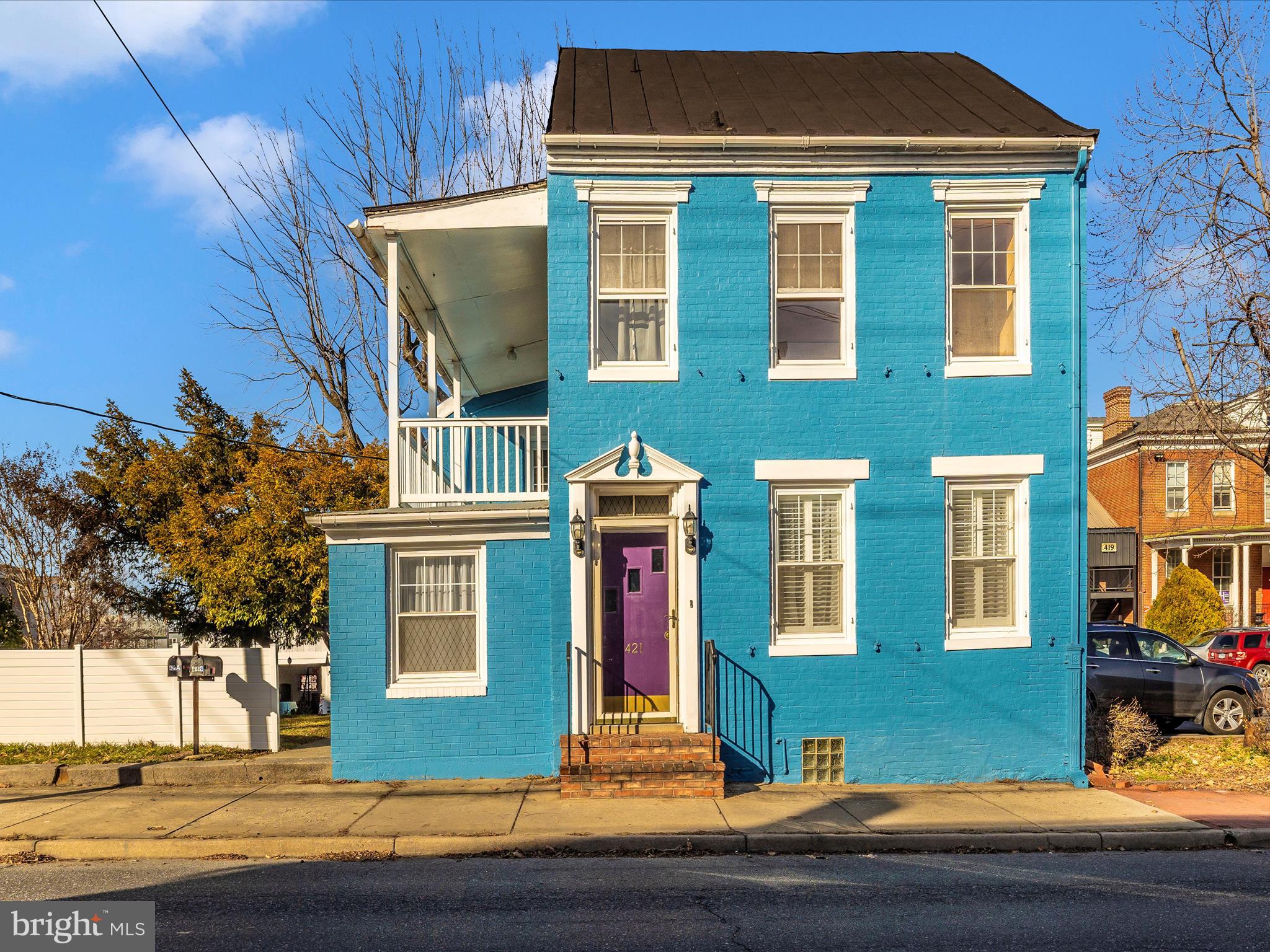 What a great opportunity to own two units with lots of garage, carport and driveway parking spaces and get some rental income while you live in one unit and have tenants in another. Let your tenant help pay for your mortgage! Not for you? You can easily convert this back to one home. The main floor unit is 1936 SF and has 3 bedrooms and 2 bathrooms and is all on one floor. The upper unit is 1,034 SF and has 2 bedrooms and 1 bath with a walk-up attic that could be renovated into a third living space. Both units have full kitchens and laundry areas. There is a one-car garage that is 23' x 23' with a huge workshop area and the second was converted to a man-cave/she-shed with loft but could easily be converted back into a 2-car garage. A carport and large, private driveway in addition make room for at least 20 cars. There is yard space behind the carport/garage for even more parking. Speaking of the yard, this home is situated on a.33 acres. You’ll forget you’re in the city with all this space, Where else will you get a yard like this and parking for 20+ cars in downtown Frederick? Walk to restaurants, shopping, catch the MARC train. Enjoy life here! Better hurry up and see this one before someone else scoops it up.