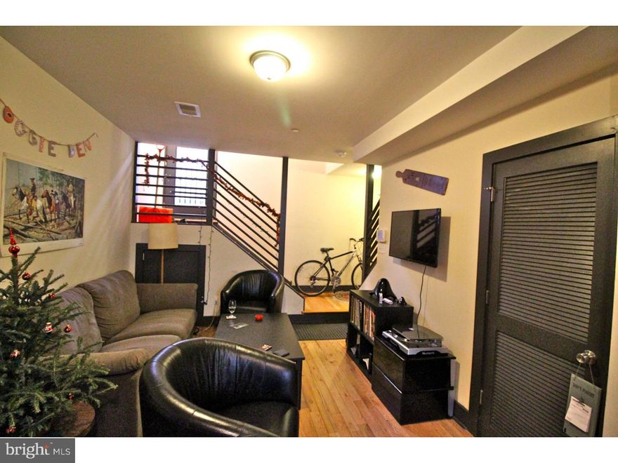 Becoming available for fall semester lease is this spacious and modern 5BR 3BA apartment with condo quality finishes.  The 1st floor has a large living room, in unit laundry and a modern Kitchen. The Kitchen has granite counters and a sleek black appliance package including a dishwasher and garbage disposal. There is also a large bedroom and bathroom on this floor.  The second level has a long hallway, with 4 bedrooms and 3 bathrooms. All bedrooms are spacious enough for full sized beds, T.V stands, and dedicated study areas with desks. This level also has exclusive access to the private fenced in yard, great for the warmer seasons.  Awesome location for Temple Main campus students. Very quick walk to main campus and Broad St.