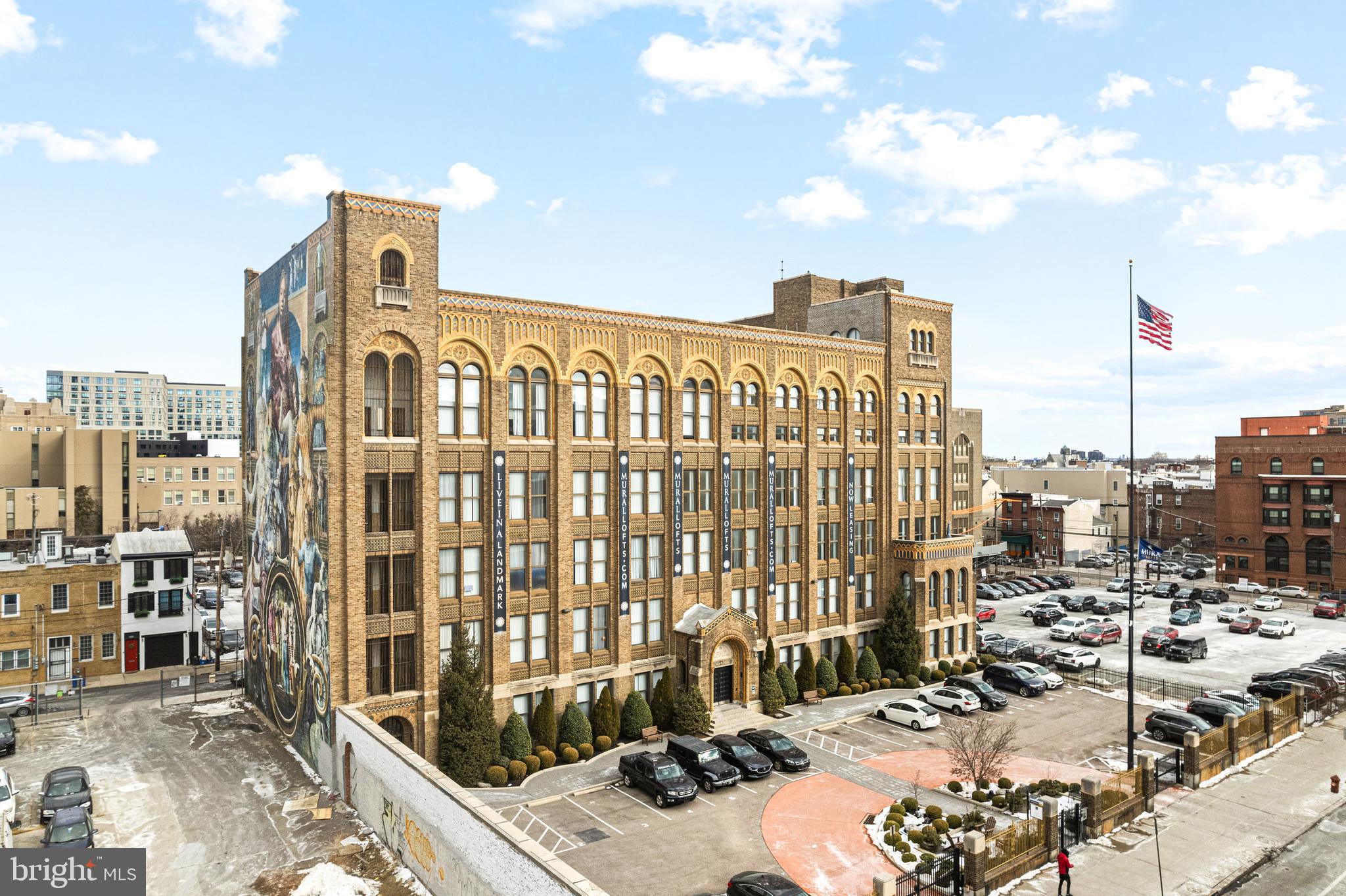 Welcome to Mural Lofts, where history meets contemporary living in the heart of Philadelphia. Located at the corner of Broad and Spring Garden, this stunning five-story building has been transformed from the historic Thaddeus Stevens School of Practice into distinctive loft apartments that blend timeless architectural details with modern comforts.
Key Features:
Unique Loft Apartments:
Each unit showcases the building’s original charm, including high ceilings, expansive windows, and intricate architectural details that set Mural Lofts apart.
Prime Location:
Situated at the gateway to the North Broad Corridor, Mural Lofts is just a few blocks from City Hall, putting you within walking distance of some of Philadelphia’s best dining and entertainment. Convenient access to public transportation makes exploring Center City effortless.
Historic Redesign:
This thoughtful redevelopment preserves the character of a landmark building while delivering all the amenities you need for modern urban living.
Come see why Mural Lofts is the perfect place to call home! Experience the unparalleled charm and convenience of living at the crossroads of history and contemporary Philadelphia.