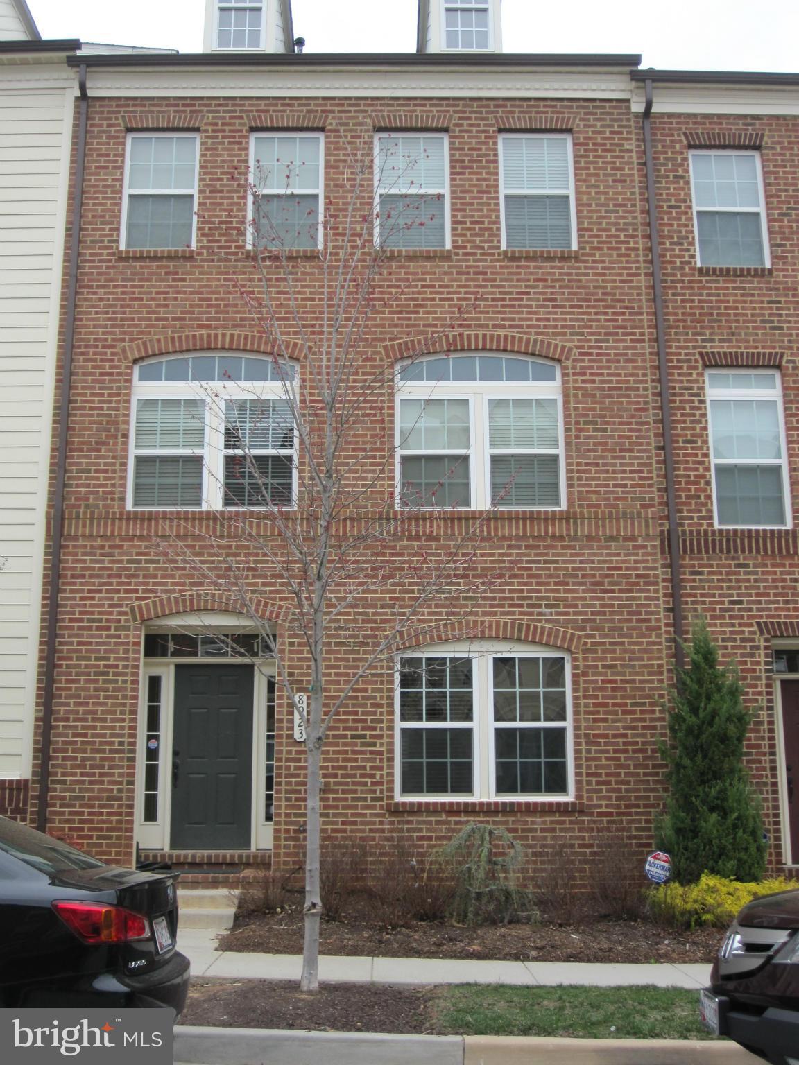 AVAILABLE NOW! Gorgeous brick front town home with 2 car garage loaded with upgrades in desirable Maple Lawn. 3300 square feet of luxury living. Hardwood floors, gourmet kitchen, granite countertops, and stainless steel appliances. Huge lower level with recreation room, full bath, and 4th bedroom/study. Steps to fine dining, Harris Teeter, shops and community clubhouse including fitness center. No pets. No smoking.