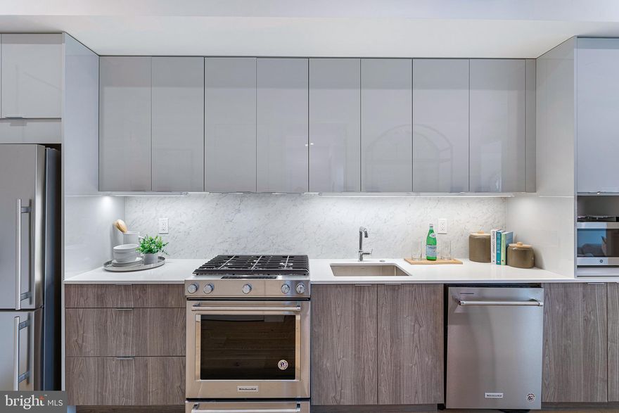 Don't miss your last chance to own a brand-new 3 bedroom  and 2 bath condo at The Stella, an exceptional collection of 18 residences now available! Each unit features sleek contemporary finishes, including custom European cabinetry, quartz countertops and backsplash, and luxurious Porcelanosa tile in the bathrooms. Enjoy 7" hardwood flooring throughout and oversized windows that bathe the space in natural light. Additional highlights include ample recessed lighting, an app-enabled security system, 9'+ ceilings, Kitchen Aid appliances, gas cooking, vented concealed range hoods, under-cabinet lighting, and adjustable closets.

Located in the thriving Petworth neighborhood with a walk score of 90, these condos come with incredibly low fees and a range of amenities, including a beautiful controlled-access lobby, a mail and package concierge system, and an indoor bike room. Seize this amazing opportunity before it’s gone!