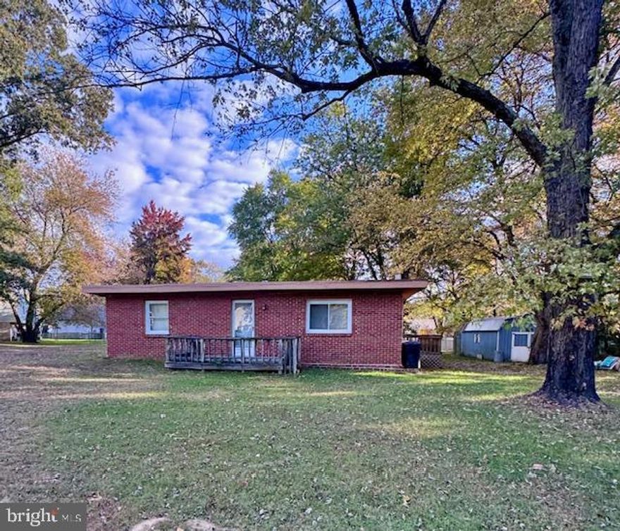 Investor special!! This home sits on a beautiful flat lot in a great neighnorhood.  It is partially gutted already and is in need of a full reno! This home is being sold "as is"  where it is.