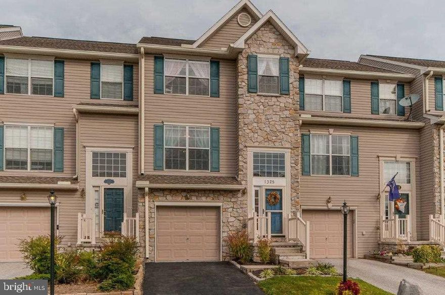 Gorgeous town home that comes with a warranty and is USDA eligible! This home has been very well maintained. Includes hardwood floors, new carpet/flooring, an open/eat-in kitchen, and a lot of storage space. Finished family room with gas fire place, private back Deck & yard, upgraded 80 gallon water heater, advanced allergen filtration system, and new storm door!