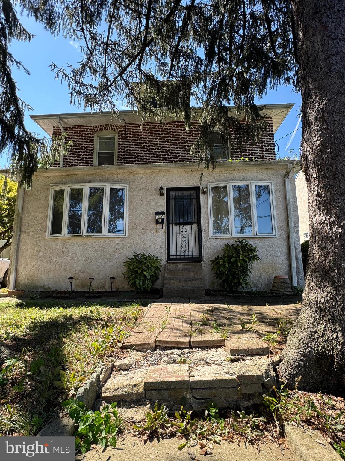 INVESTOR OR BUILDER SPECIAL!! Current duplex on a large oversized 75 x 200 lot, with a large detached 1 car garage & shop perfect for a contractor/tradesman. Currently a duplex occupied by 2 separate family members. First floor features 3 bedrooms and 2 full baths, and the second floor has 2 bedrooms and one bath. The home is in poor condition and is in need of a full remodel. Beautiful private back yard and large private driveway.