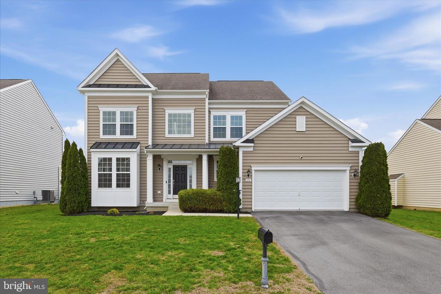 Welcome to 294 Ticonderoga Drive! This beautifully maintained Colonial home offering over 3,600 finished square feet of finished living space, featuring a landscaped front yard, charming bay window, and inviting covered porch with a stylish metal roof. A spacious two-car garage and paved driveway provide ample parking and everyday convenience and guest.
Step inside to discover elegant details throughout, including dramatic wide crown molding in the living and dining rooms, rich wood flooring across most of the main level, and turned stairs leading to the second floor. Abundant windows fill the home with natural light, creating a warm and welcoming atmosphere.
The spacious family room is perfect for gathering, complete with a cozy gas fireplace. The gourmet kitchen is a chef’s dream, showcasing 42” white cabinetry, granite countertops, a center island, and stainless steel appliances—including a double wall oven and gas cooktop.
Just off the kitchen, the bright morning room with a cathedral ceiling offers the perfect space for casual dining or relaxing with your morning coffee, with direct access to the large, privacy-fenced backyard.
Upstairs, the primary suite is a true retreat, featuring a tray ceiling, walk-in closet, and a luxurious en-suite bath with dual sinks, granite counters, a soaking tub, separate shower, and private commode enclosure.
The mostly finished basement provides abundant additional living space, including a large recreation room, play area, and a third full bath. An additional unfinished room offers excellent storage or the ideal space for a home gym.
Additional highlights include Comcast Xfinity availability—perfect for remote work—New Air Conditioning in 2025 and a location that’s ideal for commuters.
Don’t miss this exceptional opportunity to own a home that truly has it all!